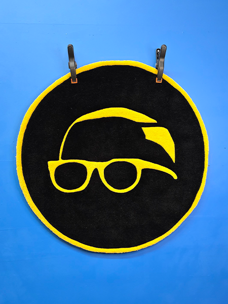 Circular club shay shay logo rug