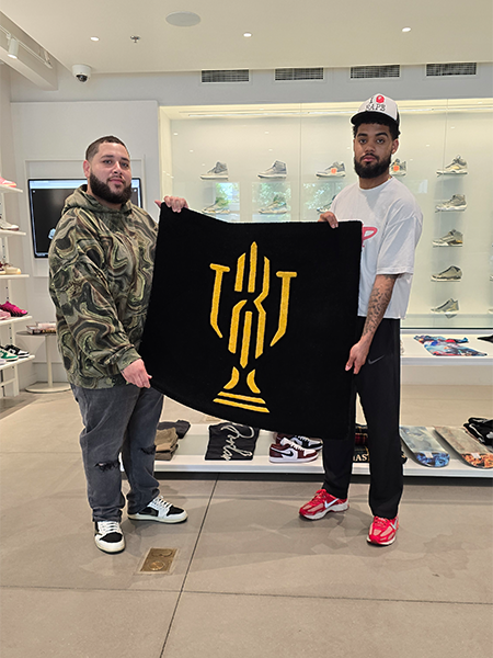 Custom logo rug displayed inside a retail store