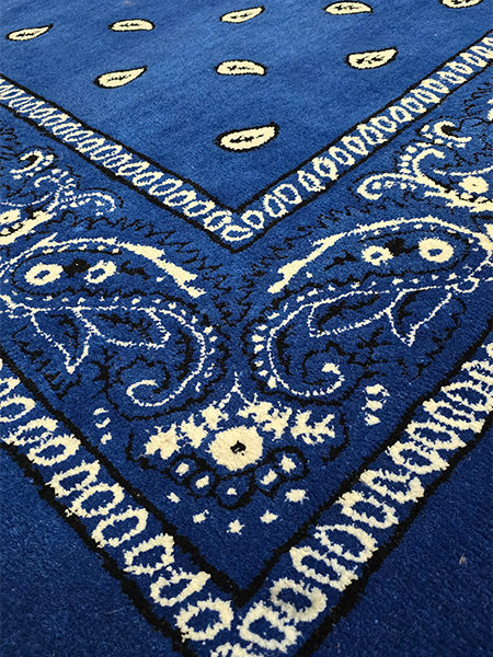 Close-up detail of a custom bandana pattern rug