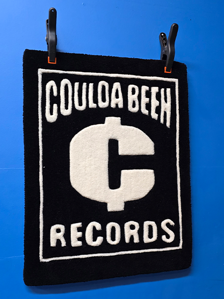 Custom record label logo rug hanging for display