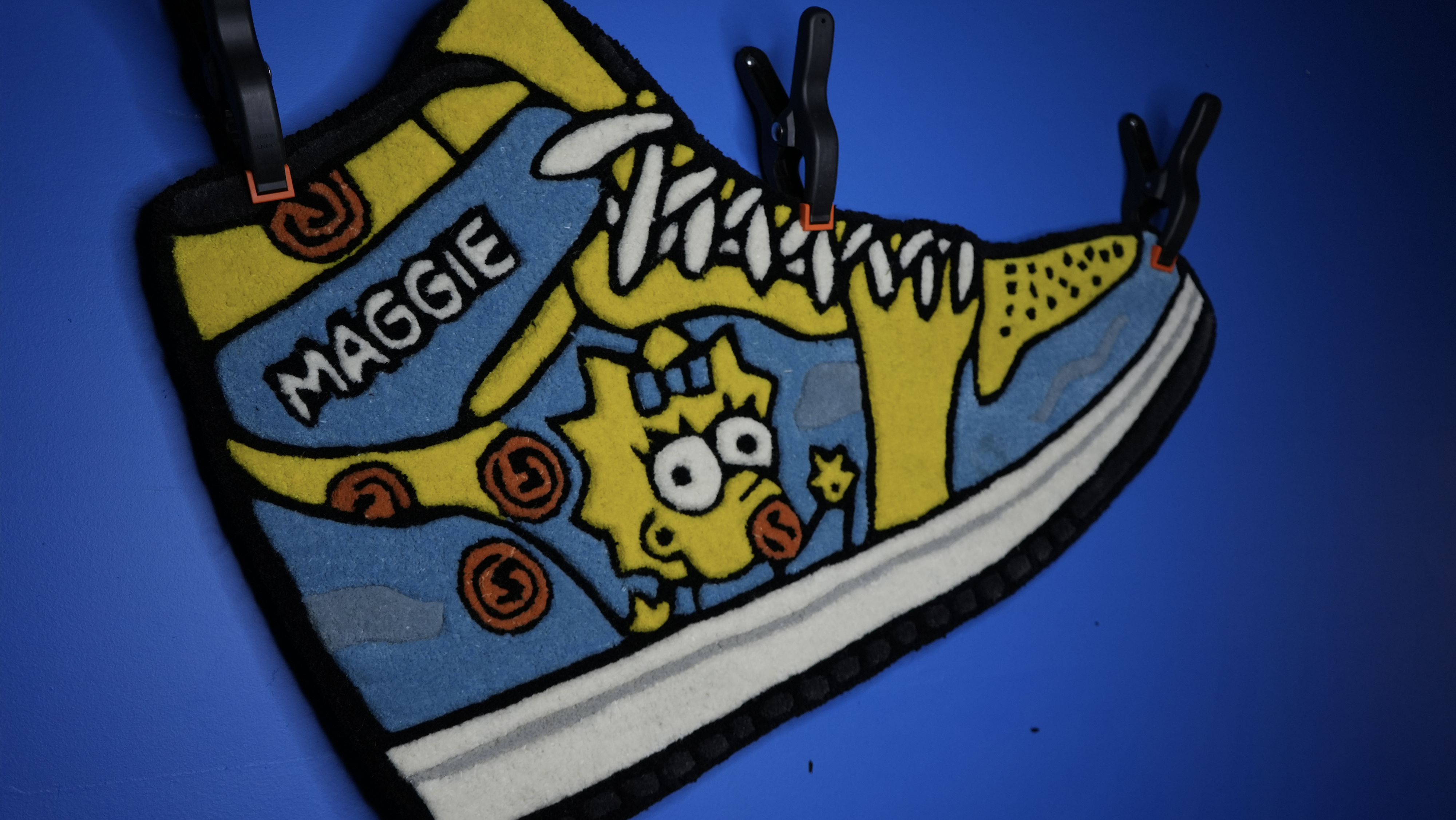 Custom sneaker shaped rug with illustrated artwork