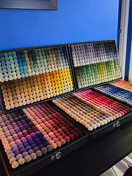 Rug fiber color swatch display showing dye options