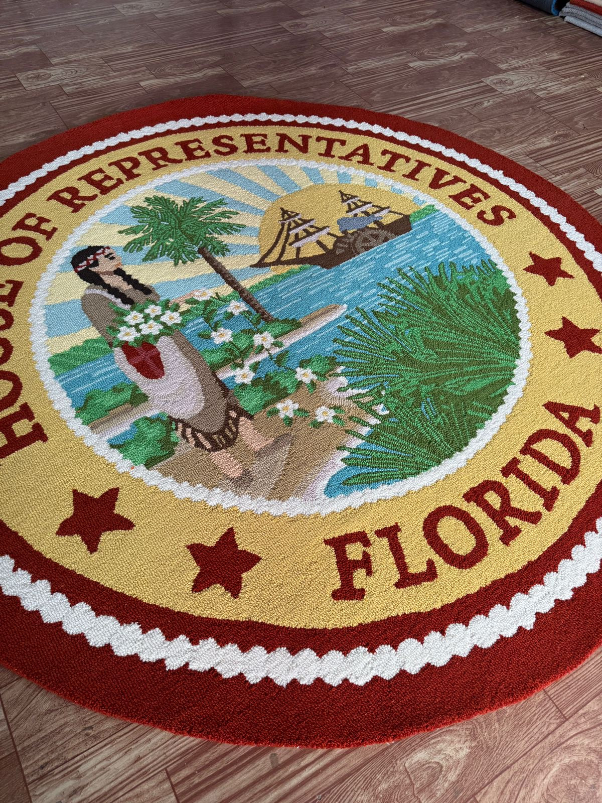 Modern living room with a large custom area rug installed